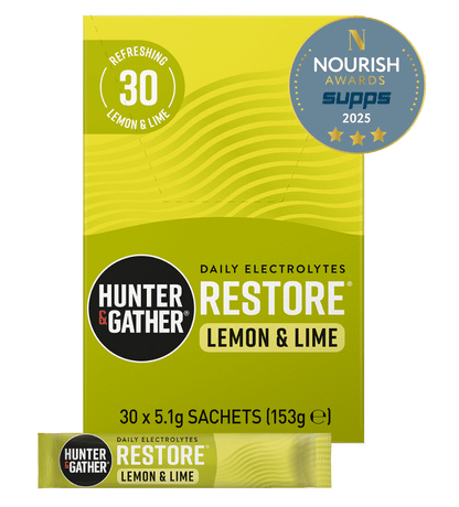 Hunter & Gather Restore Lemon & Lime electrolyte package with an award badge on a green background