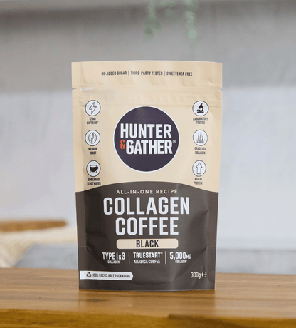 Hunter & Gather Collagen Coffee package on a wooden surface with a blurred background