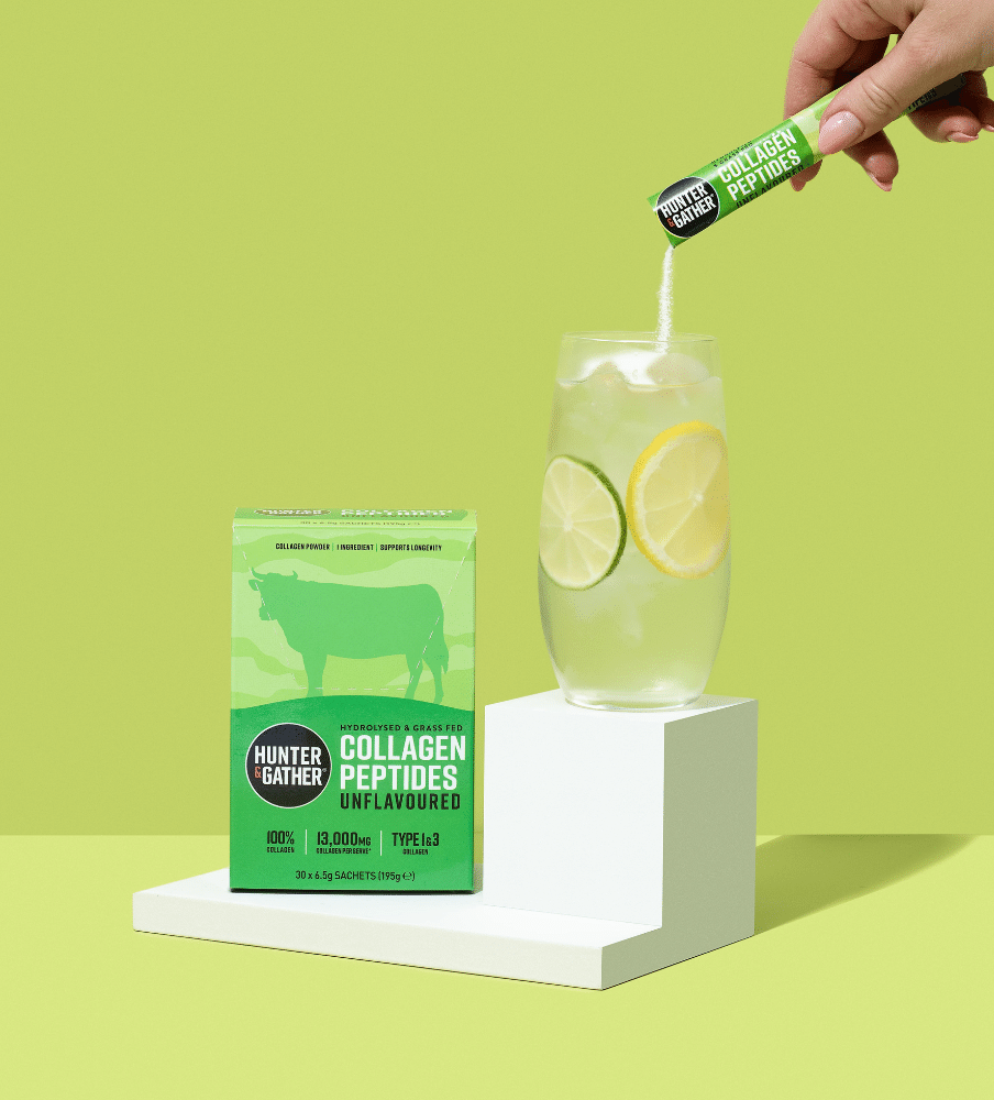 gb-en,eu-en | Collagen peptides packaging with a glass of lemonade on a green background