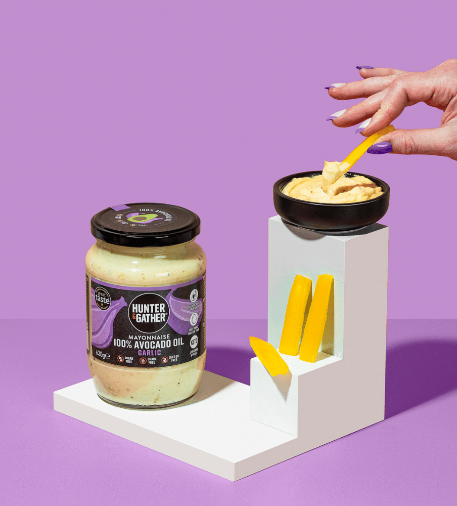 Garlic mayonnaise dunking pepper slices