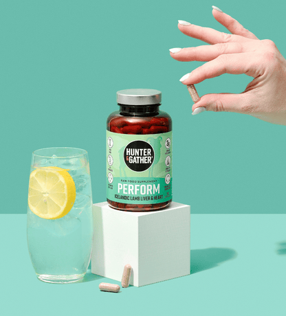 Raw Icelandic Lamb Perform Liver & Heart Capsule Lifestyle Shot with water