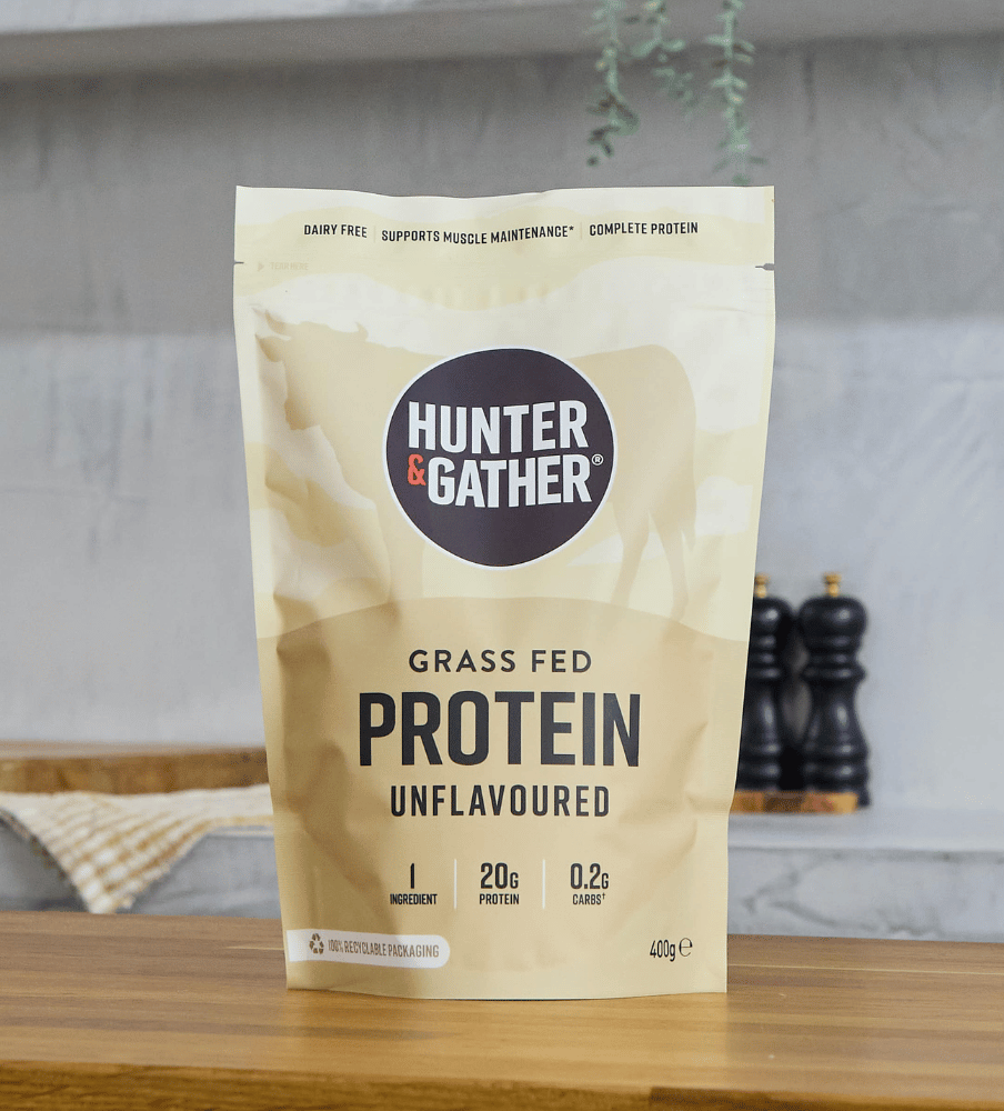 Hunter & Gather protein package on a wooden surface with a neutral background